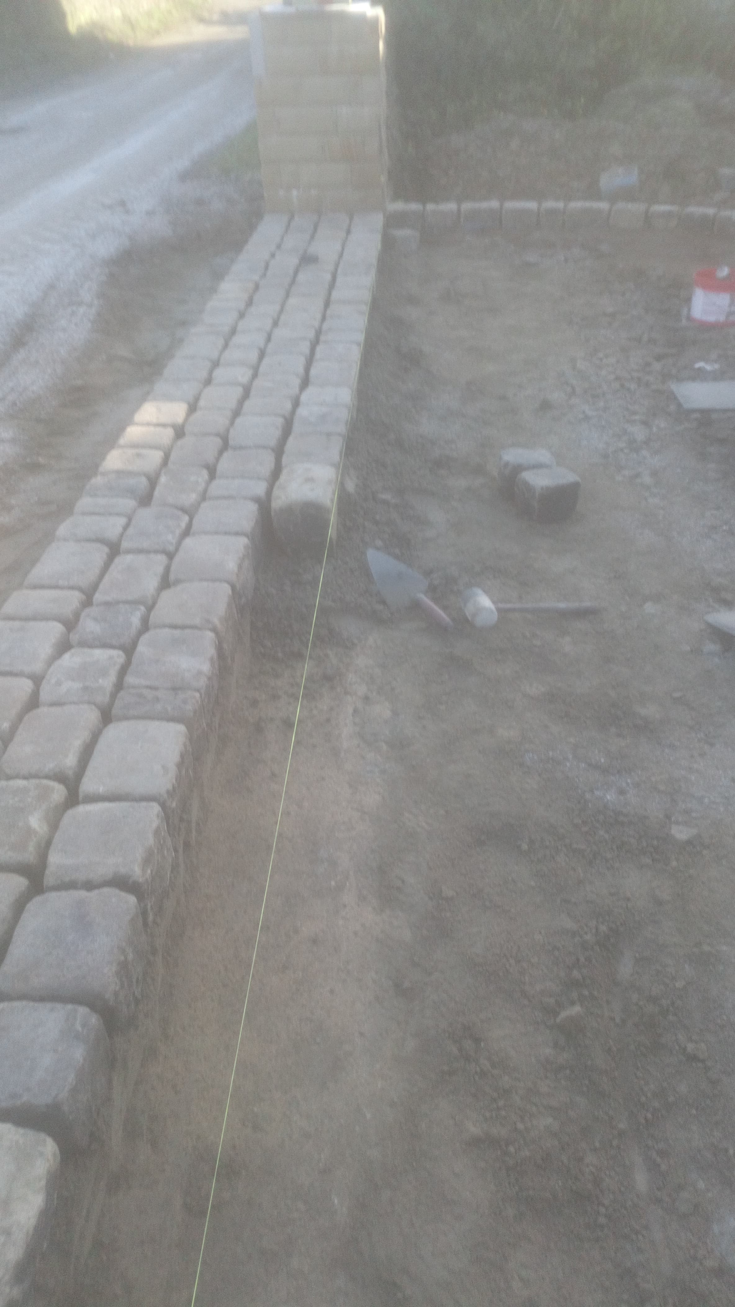 Higher Leafield Barn — coursing the cobble walling along the drive edge